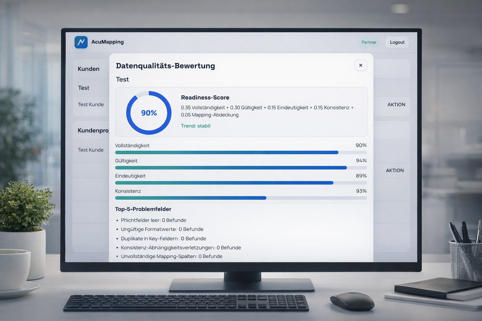 Laptop mit Business-Kennzahlen und Tabellenstruktur